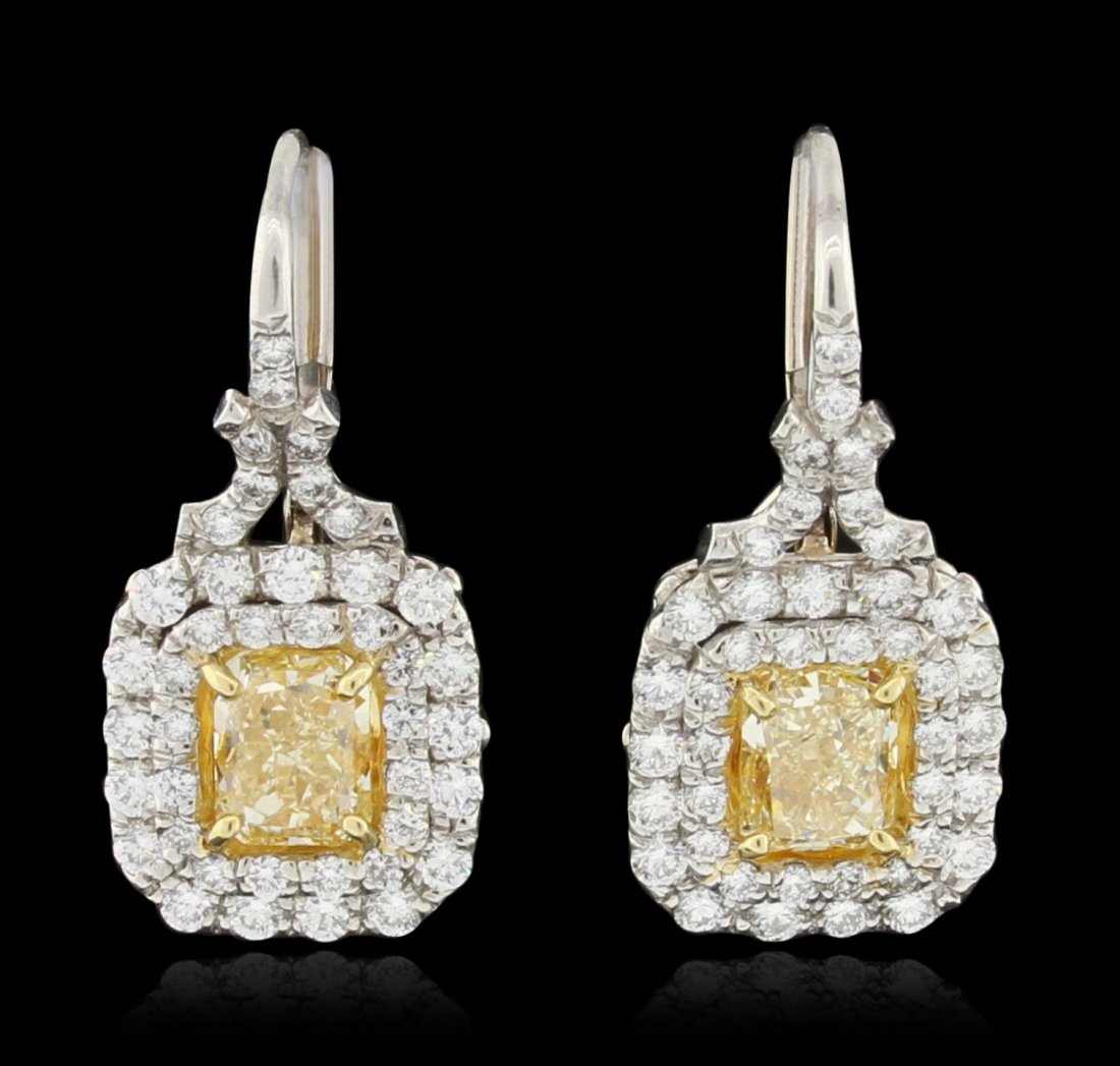 Platinum 2.16ctw EGL Cert Fancy Yellow Diamond Earrings: Platinum 2.16ctw EGL Cert Fancy Yellow Diamond Earrings HK6. Good Condition. LF1059GN. One pair of platinum fancy intense yellow diamond earrings, consisting of two cut cornered rectangular modified b