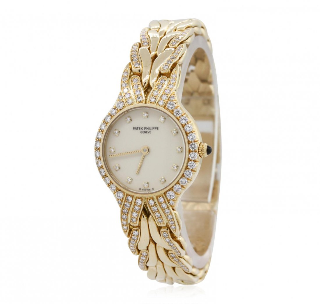 Ladies Patek Philippe La Flame 18KT Yellow Gold Diamond: Ladies Patek Philippe La Flame 18KT Yellow Gold Diamond Wristwatch GB5702. G-6 Extra Fine Condition! HJ40021GA. One, Patek Philippe La Flame wristwatch electronically tested 18KT yellow gold, Case: 23