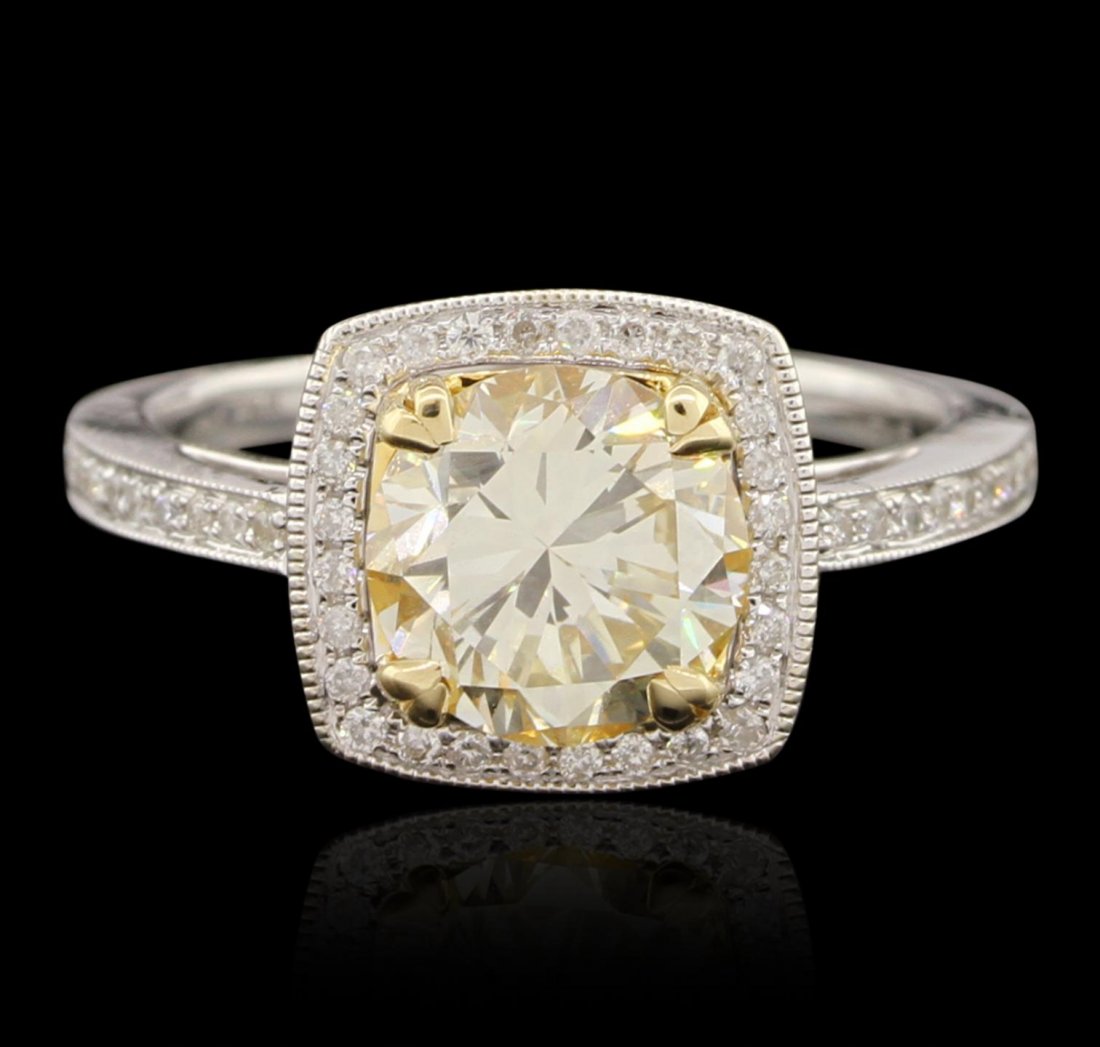 14KT White Gold 2.00ct VS1/Light Yellow Diamond Ring: 14KT White Gold 2.00ct VS1/Light Yellow Diamond Ring A6490. Great Condition! VN37031HK. One electronically tested 14KT white gold ladies cast diamond ring. The featured diamond is mounted in a yellow 