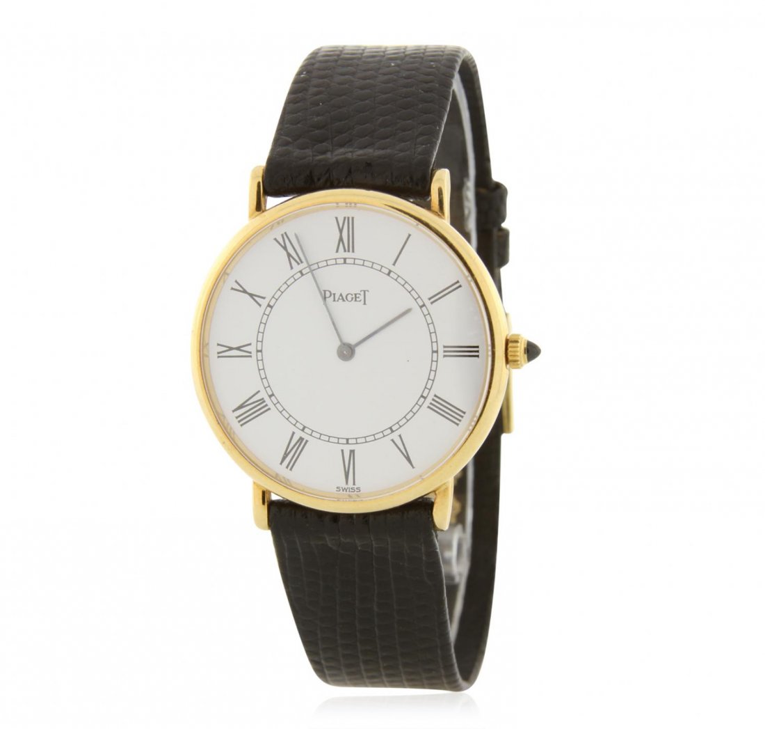 Gents Piaget Wristwatch LAJB103: Gents Piaget Wristwatch LAJB103. Good Condition! TR5041NB. One gents Piaget 5/8 S Vintage Watch. This watch features Genuine Lizard Buckle Band, Mechanical Hand-winding movement, Analog Display, 18KT 