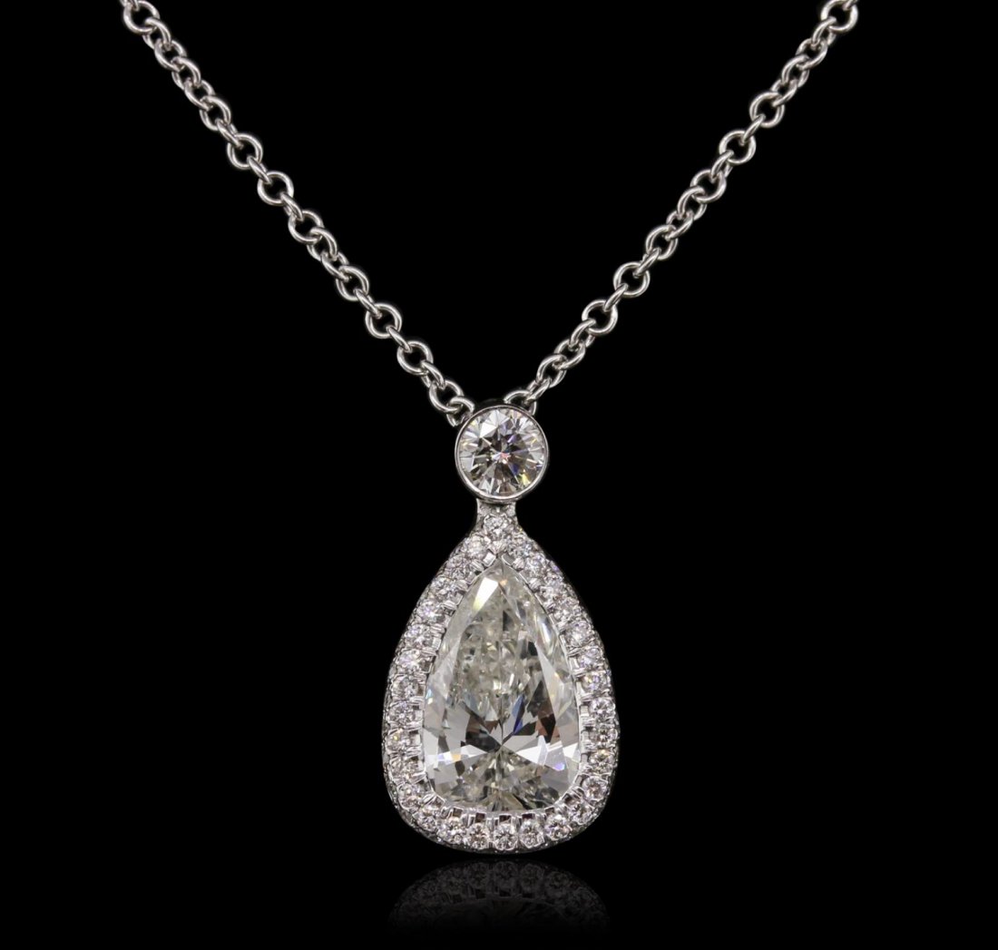 18KT White Gold 2.34ctw Diamond Pendant With Chain With: 18KT White Gold 2.34ctw Diamond Pendant With Chain With Chain GB6043. Great Condition! XE8007WR. One electronically tested 18KT white gold ladies cast & assembled diamond pendant with chain. Condition