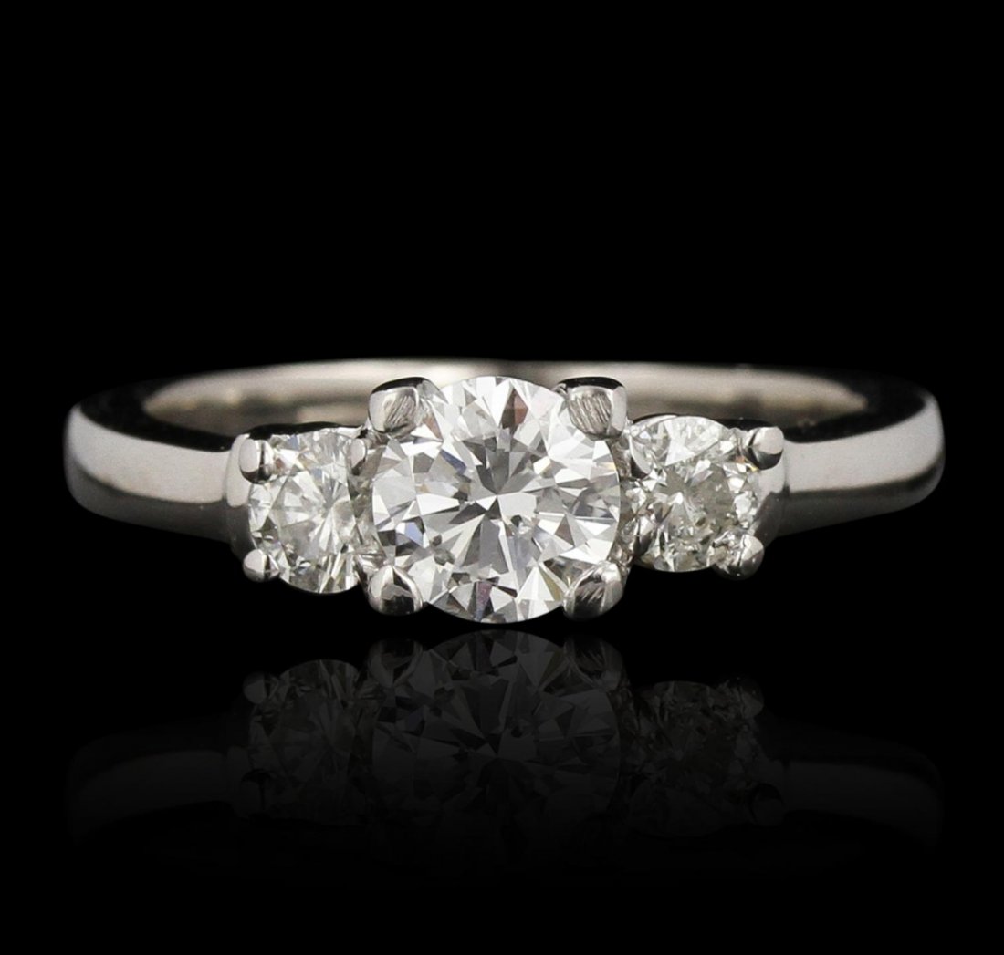 Platinum 1.00ctw Diamond Wedding Ring GB4276: Platinum 1.00ctw Diamond Wedding Ring GB4276. Excellent Condition! NZ2041GG. One electronically tested platinum lady's combination cast & assembled diamond engagement ring with a bright polish finish.