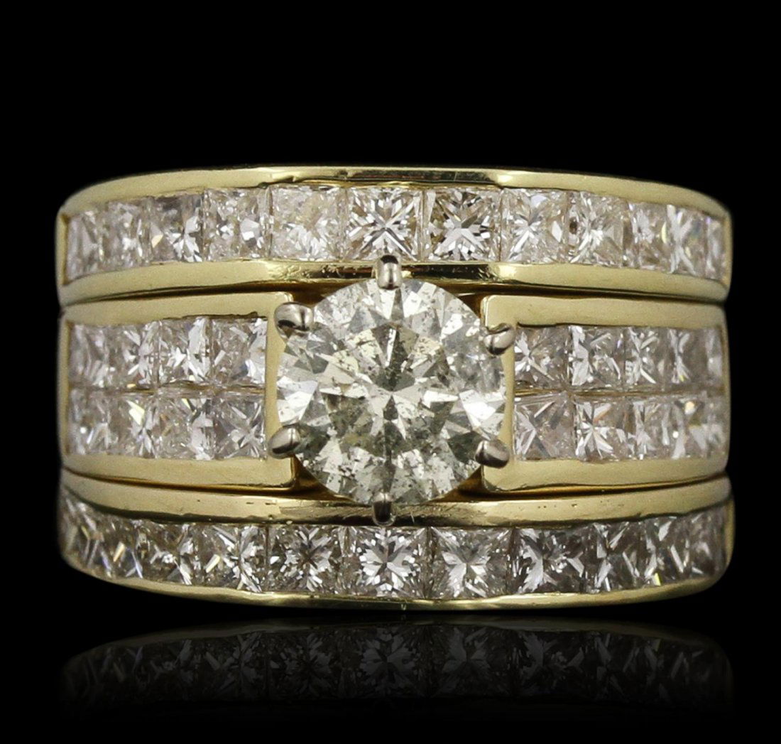 18KT Yellow Gold 1.20ct I-1/K Diamond Wedding Ring Set: 18KT Yellow Gold 1.20ct I-1/K Diamond Wedding Ring Set GB3509. Good Condition! GN2573PU. One electronically tested 18KT yellow gold ladies cast & assembled diamond wedding set. Condition is good. The