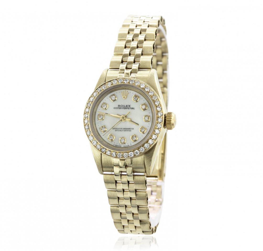 Ladies Rolex 14KT Yellow Gold Diamond Oyster Perpetual: Ladies Rolex 14KT Yellow Gold Diamond Oyster Perpetual Wristwatch A10044. G-4 Average Condition! FG6005XX. One ladies, hand crafted and machine milled Rolex Oyster Perpetual, model wristwatch electron