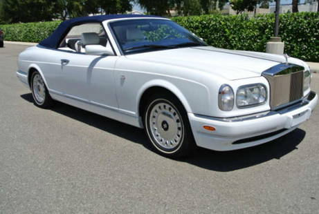 2001 White Rolls-Royce Corniche Convertible: 2001 White Rolls-Royce Corniche Convertible. As-Is Condition. XT120001MD. 2001 Rolls Royce Corniche ordered in White exterior with White leather interior and blue top, piping, dash and carpets. Lovely