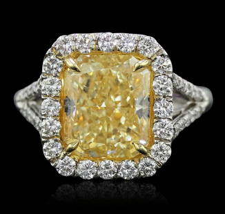 Platinum and 18KT Yellow Gold 5.91ctw EGL USA Certified: Platinum and 18KT Yellow Gold 5.91ctw EGL USA Certified Diamond Ring HK39. New Condition! GU50004WN. One electronically tested platinum and 18KT yellow gold lady's combination cast & assembled engagem