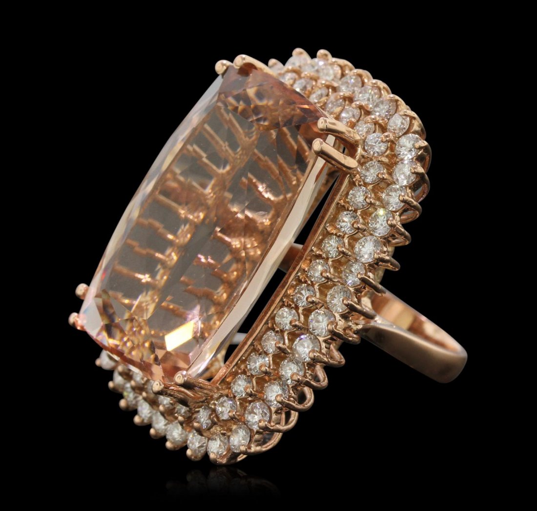 14KT Rose Gold GIA Certified 40.64ct Morganite and: 14KT Rose Gold GIA Certified 40.64ct Morganite and Diamond Ring A9409. New Condition! UV8006UB. One electronically tested 14KT rose gold ladies cast morganite and diamond ring with a bright polish fin
