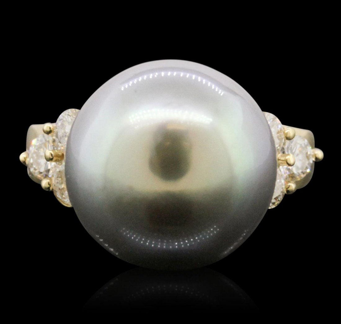 14KT Yellow Gold Pearl and Diamond Ring JS44: 14KT Yellow Gold Pearl and Diamond Ring JS44. New Condition! DA656KE. One electronically tested 14KT yellow gold ladies cast tahitian cultured pearl and diamond ring with a bright polish finish. The f