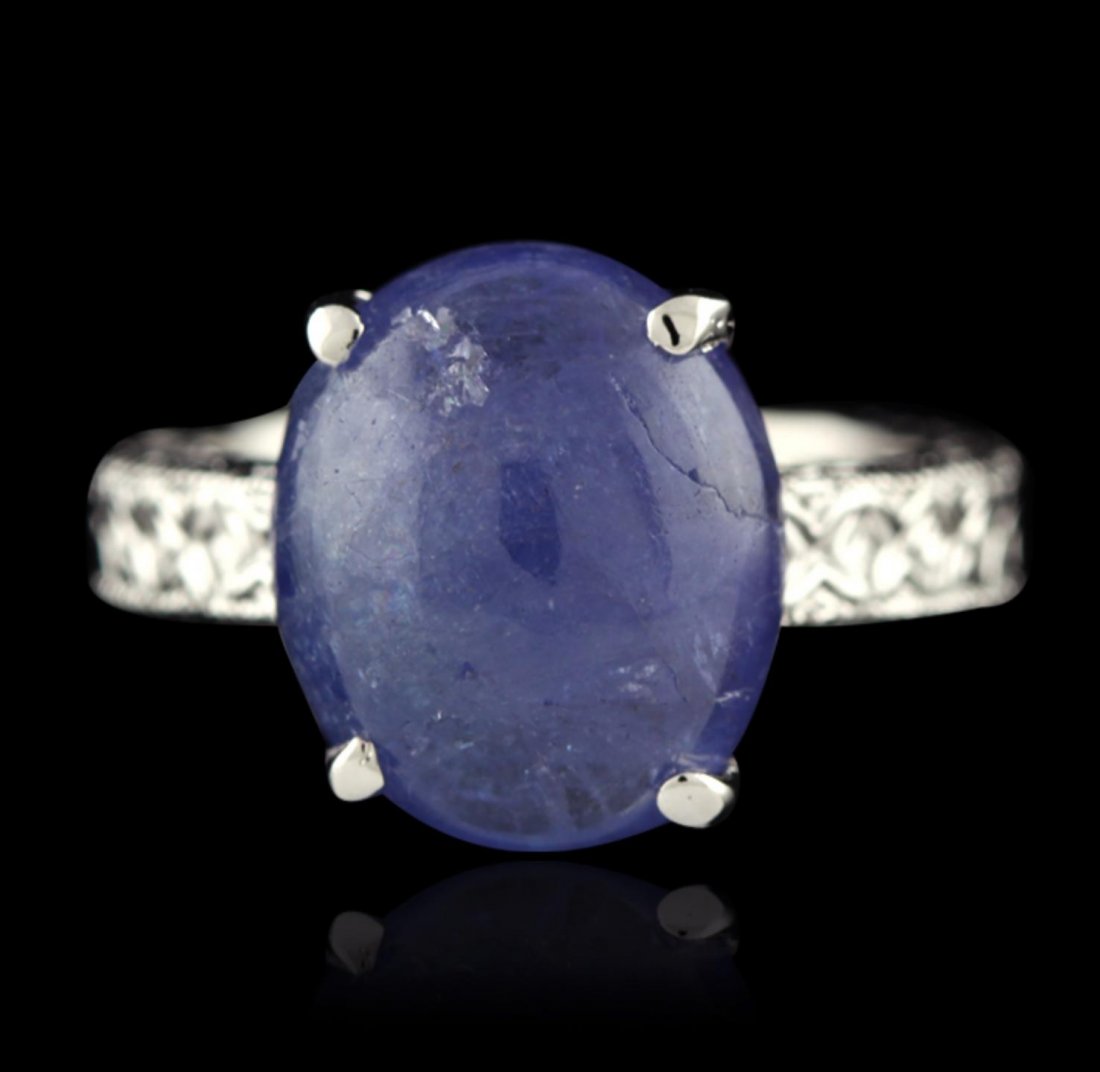 SILVER 10.38ct Tanzanite Ring SLV490: SILVER 10.38ct Tanzanite Ring SLV490. New Condition! BH321TY. One electronically tested 925 silver ladies cast tanzanite solitaire ring with a bright and migraine finish. The featured tanzanite is sup