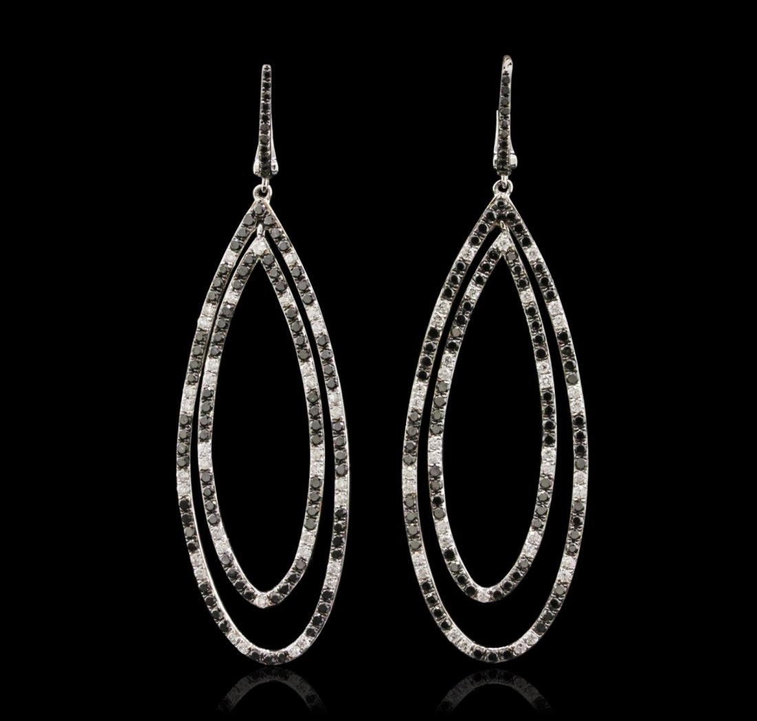 14KT White Gold 2.04ctw Black and White Diamond: 14KT White Gold 2.04ctw Black and White Diamond Earrings LAJ111. New Condition! XR5021AK. One pair electronically tested 14KT white gold ladies cast & assembled black and white diamond dangle earrings