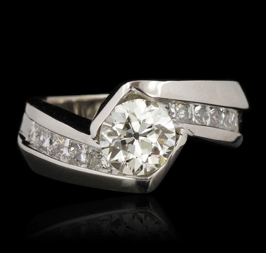 14KT White Gold 1.45ctw Diamond Wedding Ring GB4280: 14KT White Gold 1.45ctw Diamond Wedding Ring GB4280. Excellent Condition! TT5572WS. One electronically tested 14KT white gold Ladies combination cast & assembled diamond engagement ring with a bright