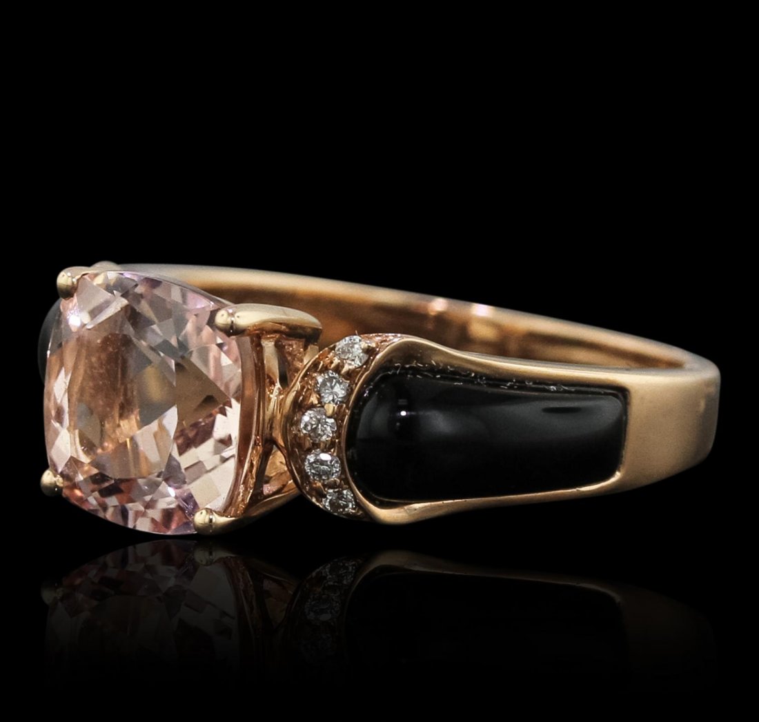 14KT Rose Gold 2.47ct Morganite, Onyx and Diamond Ring: 14KT Rose Gold 2.47ct Morganite, Onyx and Diamond Ring CRJ303. Good Condition! BF505FP. One ring featuring: 14KT rose gold with a total weight of 3.00 grams, (1) morganite with a total weight of 2.47c