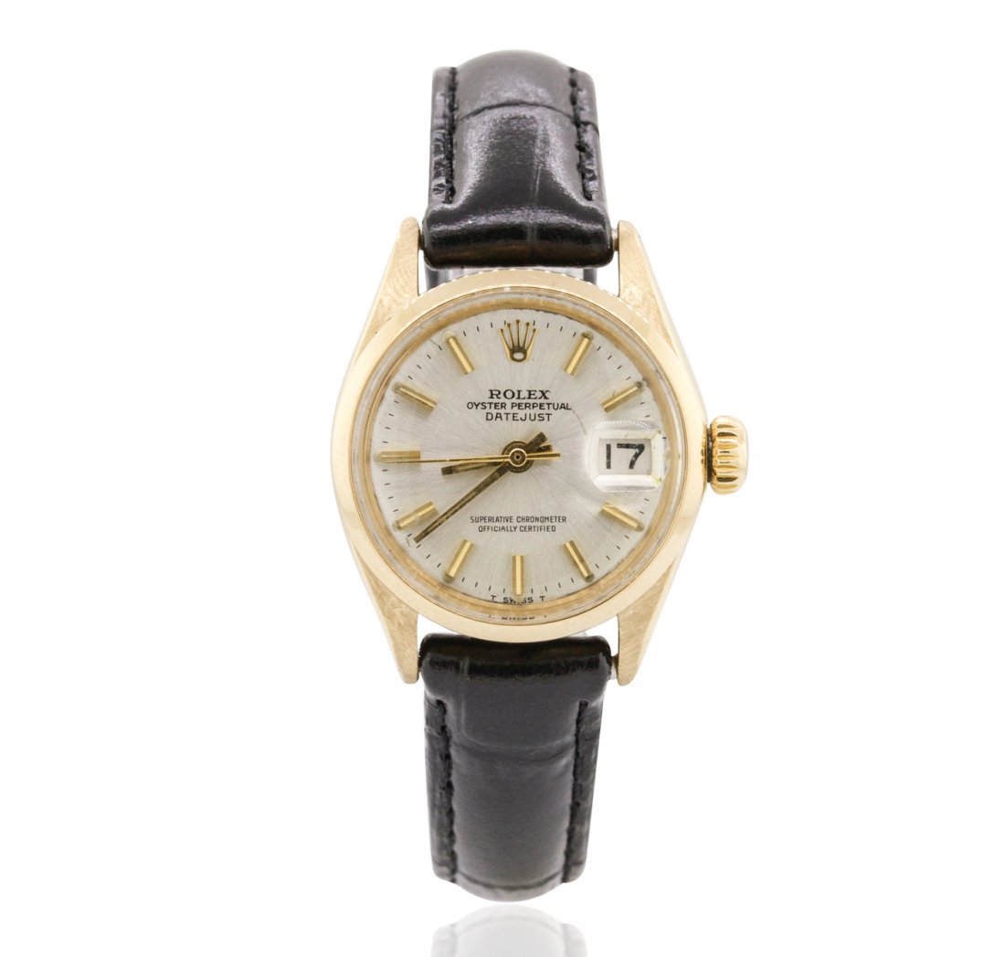 Ladies Vintage Rolex DateJust 18KT Yellow Gold: One ladies, vintage Rolex DateJust model wristwatch electronically tested 18KT yellow gold, Case: 25mm oyster, Crown: twinlock with logo, Bezel: fluted, Custom Crystal: acrylic cyclops lens, Circa: 19