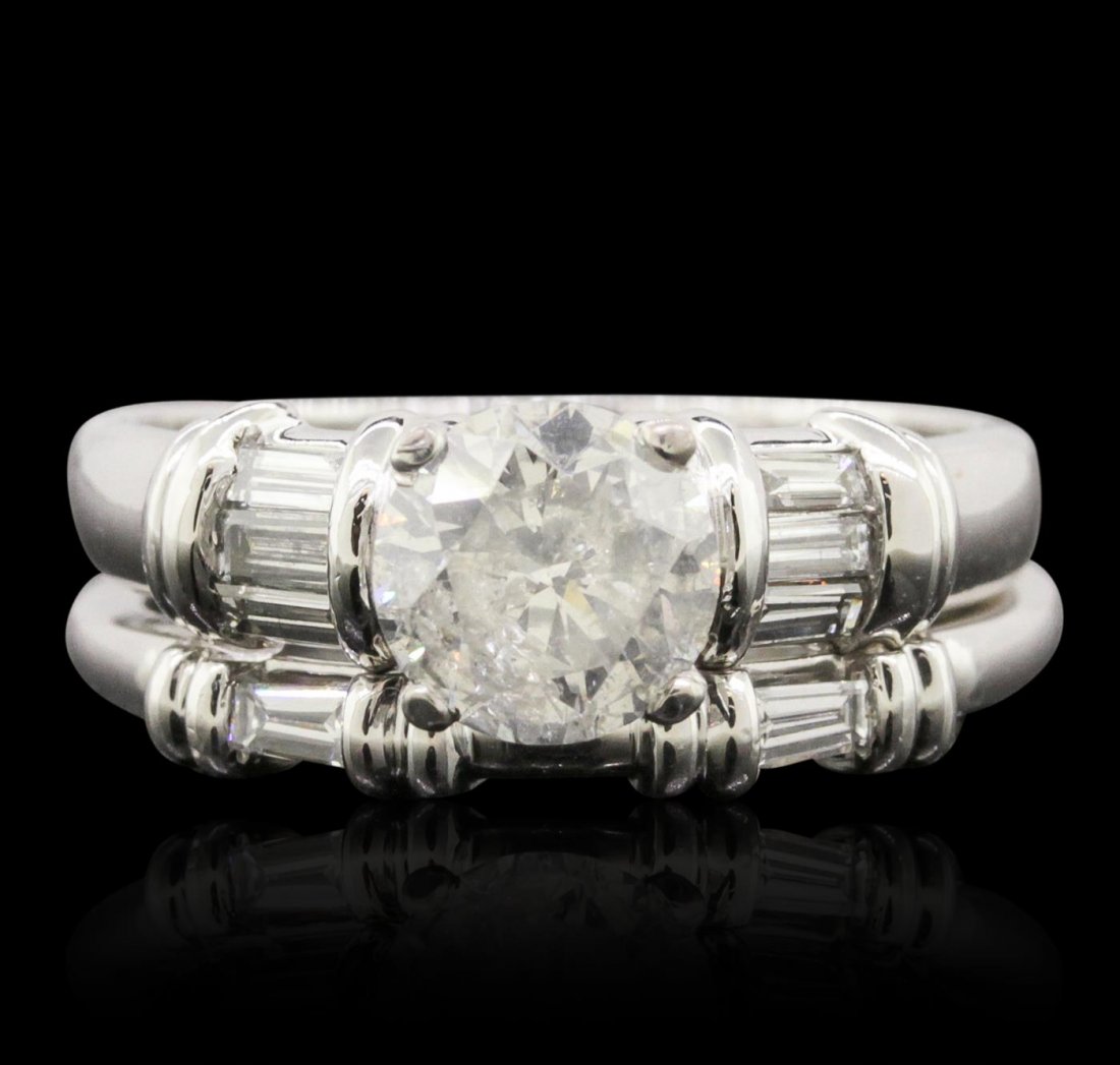 Platinum 2.00ctw Diamond Ring Wedding Set: One electronically tested platinum ladies combination cast & assembled engagement ring & wedding band with a bright polish finish. Condition is new. Identified with markings of "PT 950". Containing: O