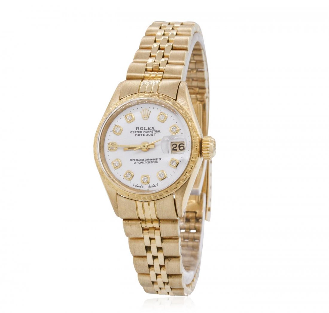 Ladies Rolex 18KT Yellow Gold DateJust Vintage: One ladies, hand crafted & machine milled vintage Rolex DateJust model wristwatch electronically tested 18KT yellow gold, Case: 25mm oyster, Crown: twinlock with logo, Original Textured Bezel: bark fi