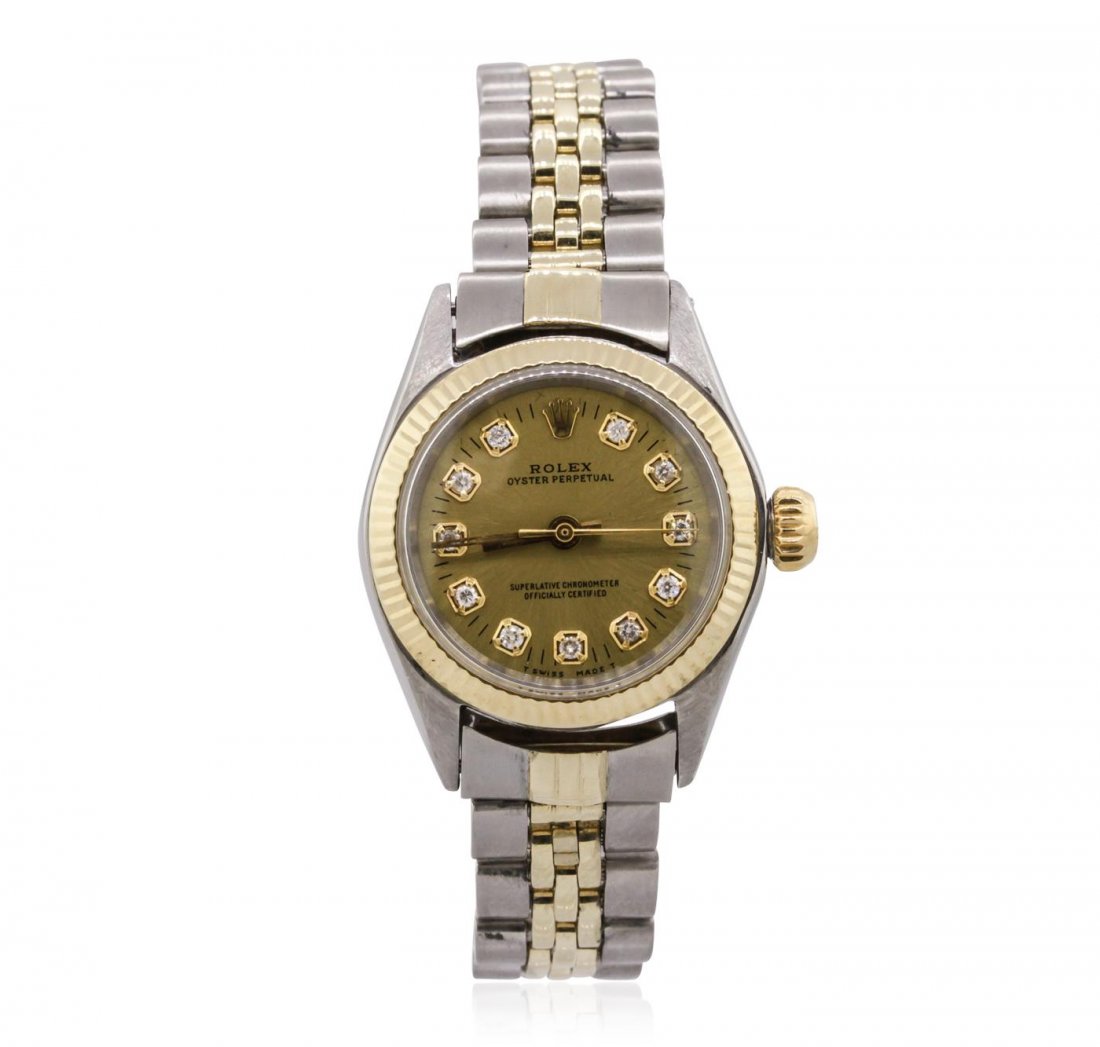Ladies Rolex Two-Tone Oyster Perpetual Wristwatch: One ladies, Vintage Rolex Oyster Perpetual Model wristwatch electronically tested, Stainless Steel Case: 25mm oyster, 14KT yellow gold Crown: twinlock with logo, Bezel: 14KT yellow gold fluted, Custom