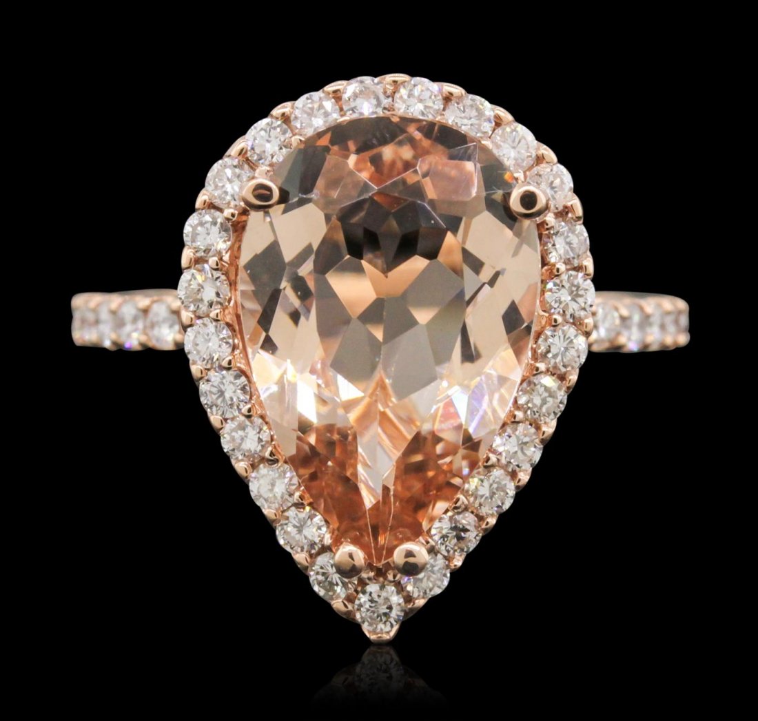 14KT Rose Gold 4.70ct Morganite and Diamond Ring: One electronically tested 14KT rose gold Ladies combination cast & assembled ring with a bright polish finish. Condition is new. Identified with markings of "14K". Containing: One prong set pear modif