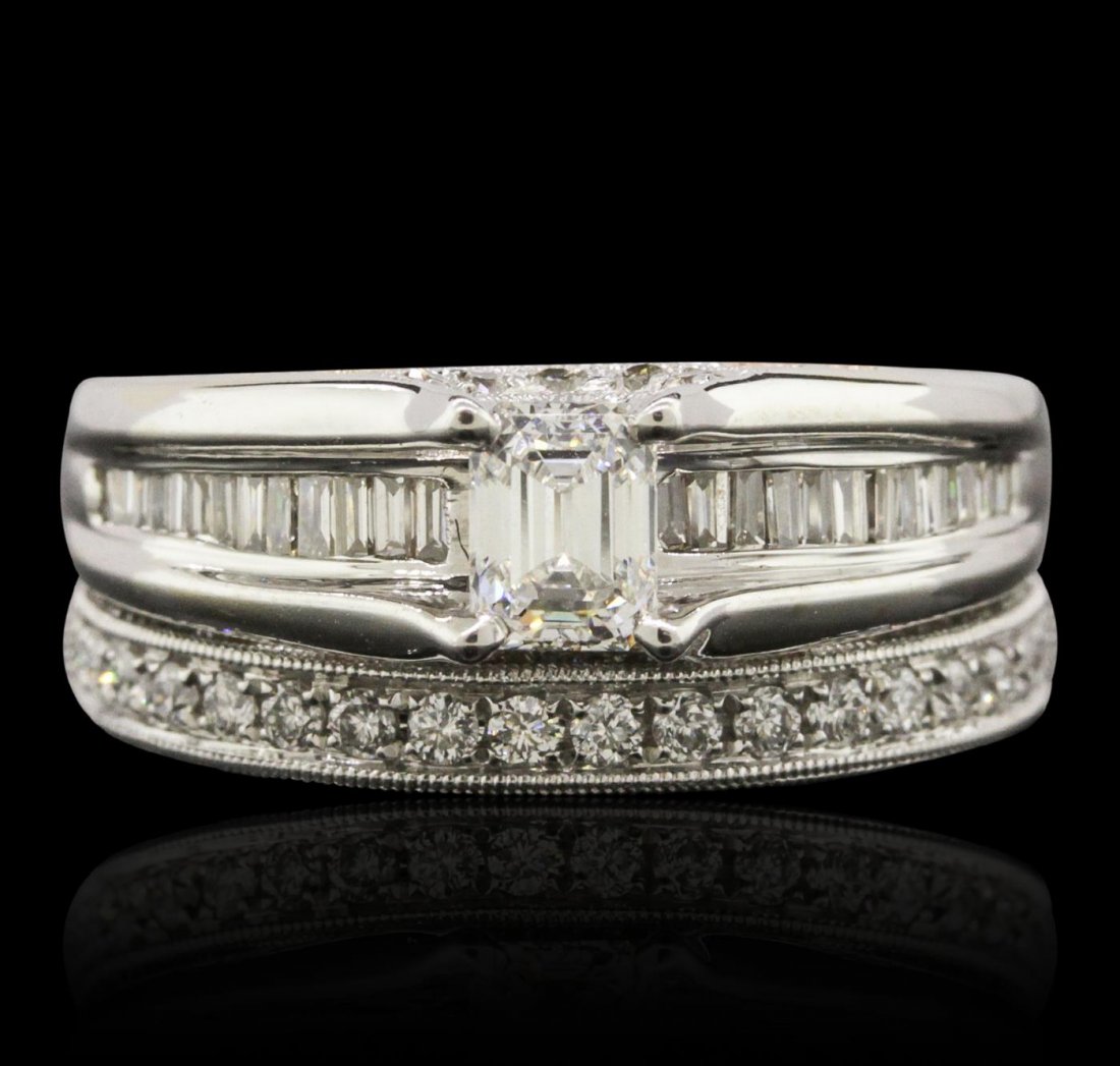 14KT and 18KT White Gold 1.73ctw Diamond Ring Wedding: One electronically tested 14KT and 18KT white gold ladies cast & assembled diamond wedding set. Condition is good. The wedding set includes a diamond engagement ring and a diamond wedding band. The en