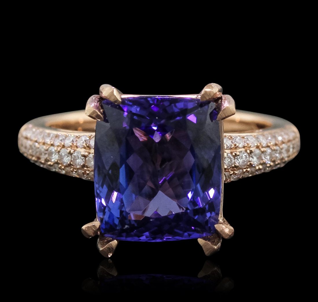 14KT Rose Gold 5.08ct Tanzanite and Diamond Ring: One electronically tested 14KT rose gold Ladies combination cast & assembled ring with a bright polish finish. Condition is new. Identified with markings of "14K". Containing: One prong set rectangula