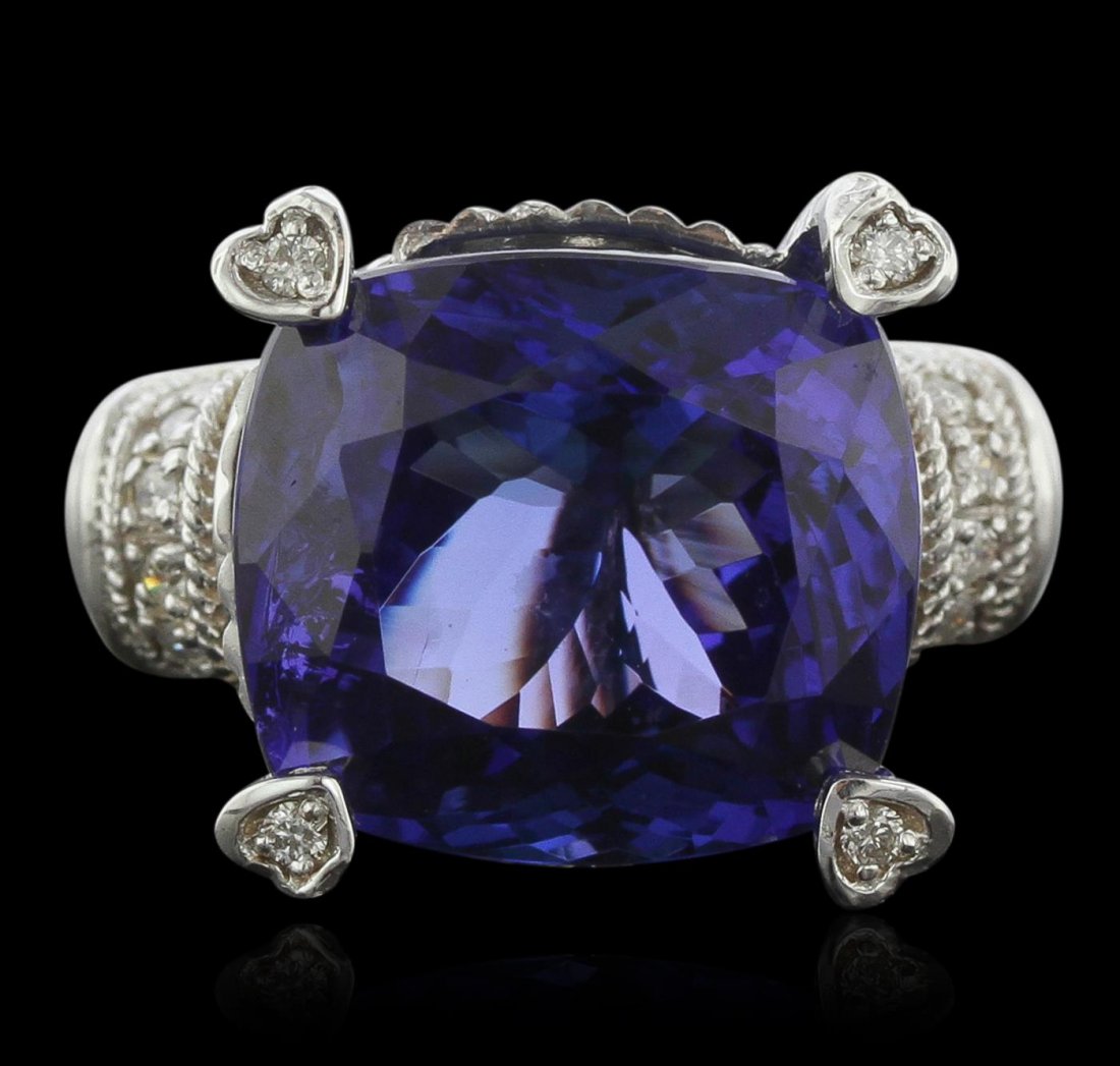 14KT White Gold 15.57ct Tanzanite and Diamond Ring: One electronically tested 14KT white gold Ladies combination cast & assembled ring with a bright polish finish. Condition is new. Identified with markings of "14K". Containing: One prong set square cu