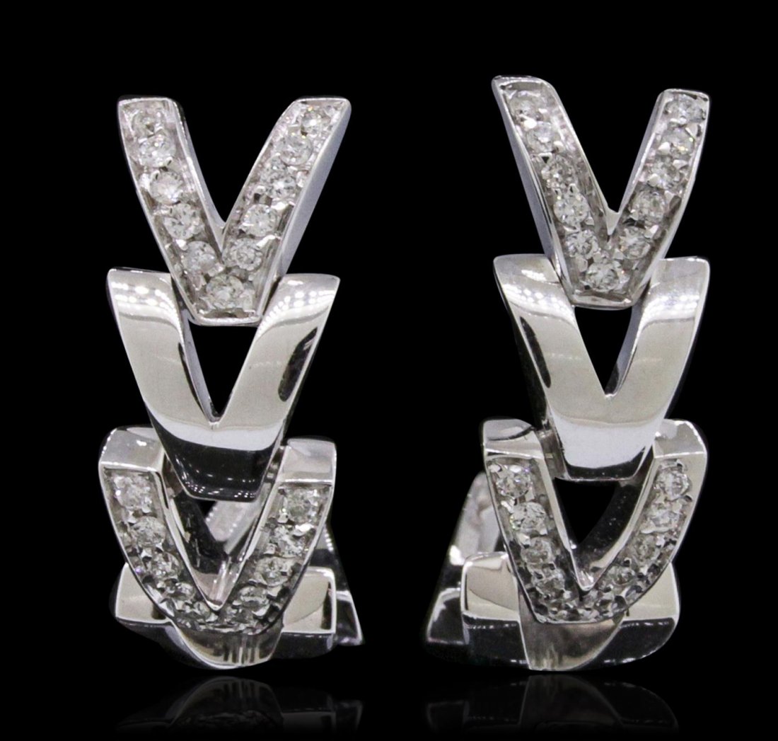 18KT White Gold 0.44ctw Diamond Versace Earrings: One pair of versace earrings featuring: 18KT white gold weighing 13.3 grams containing 44 brilliant cut diamonds with a total weight of 0.44cts. .
