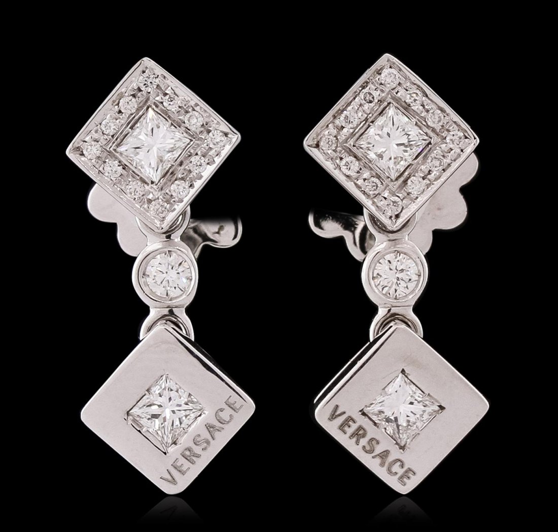 18KT White Gold 0.86ctw Diamond Versace Earrings: One pair electronically tested 18KT white gold ladies combination cast & assembled Versace earrings with friction posts with a bright polish finish. Trademark is VERSACE. Identified with markings of "
