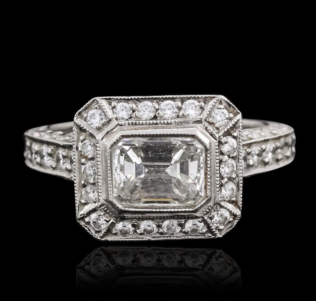 Platinum EGL Certified 1.87ctw Emerald Cut Diamond Ring: One electronically tested platinum ladies combination cast & assembled engagement ring with a bright polish finish. Identified with markings of "PT 900". Condition is new. Containing: One bezel set em
