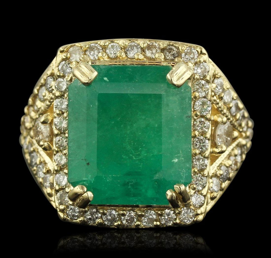 14KT Yellow Gold 9.19ct Emerald and Diamond Ring: One electronically tested 14KT yellow gold Ladies combination cast & assembled ring with a bright polish finish. Condition is new. Containing: One prong set emerald standard step cut natural emerald,