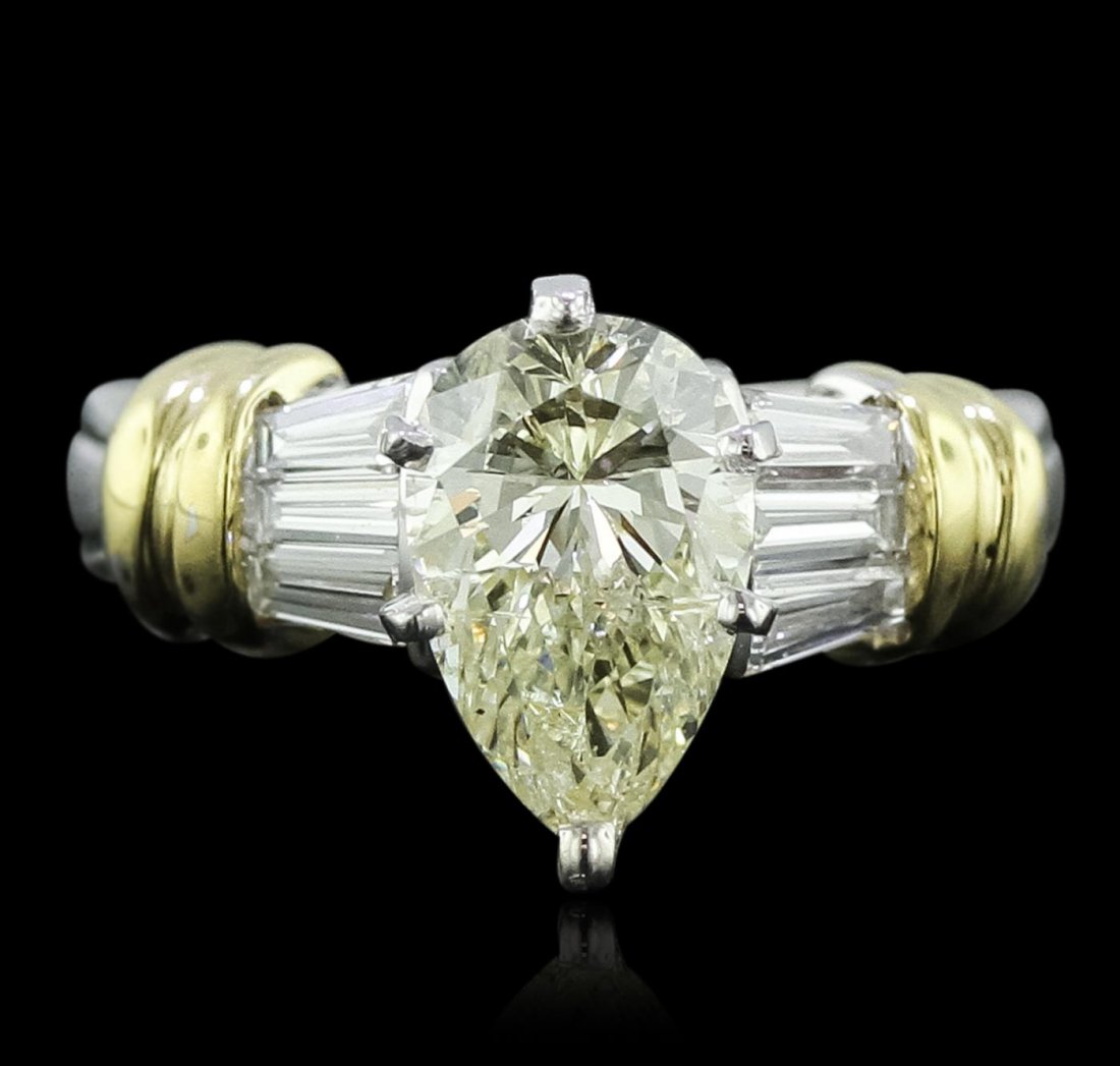 Platinum 2.56ctw Pear Cut Diamond Ring: One electronically tested platinum Ladies combination cast & assembled engagement ring with a bright polish finish. Condition is new. Identified with markings of "PT 900". Containing: One prong set pe