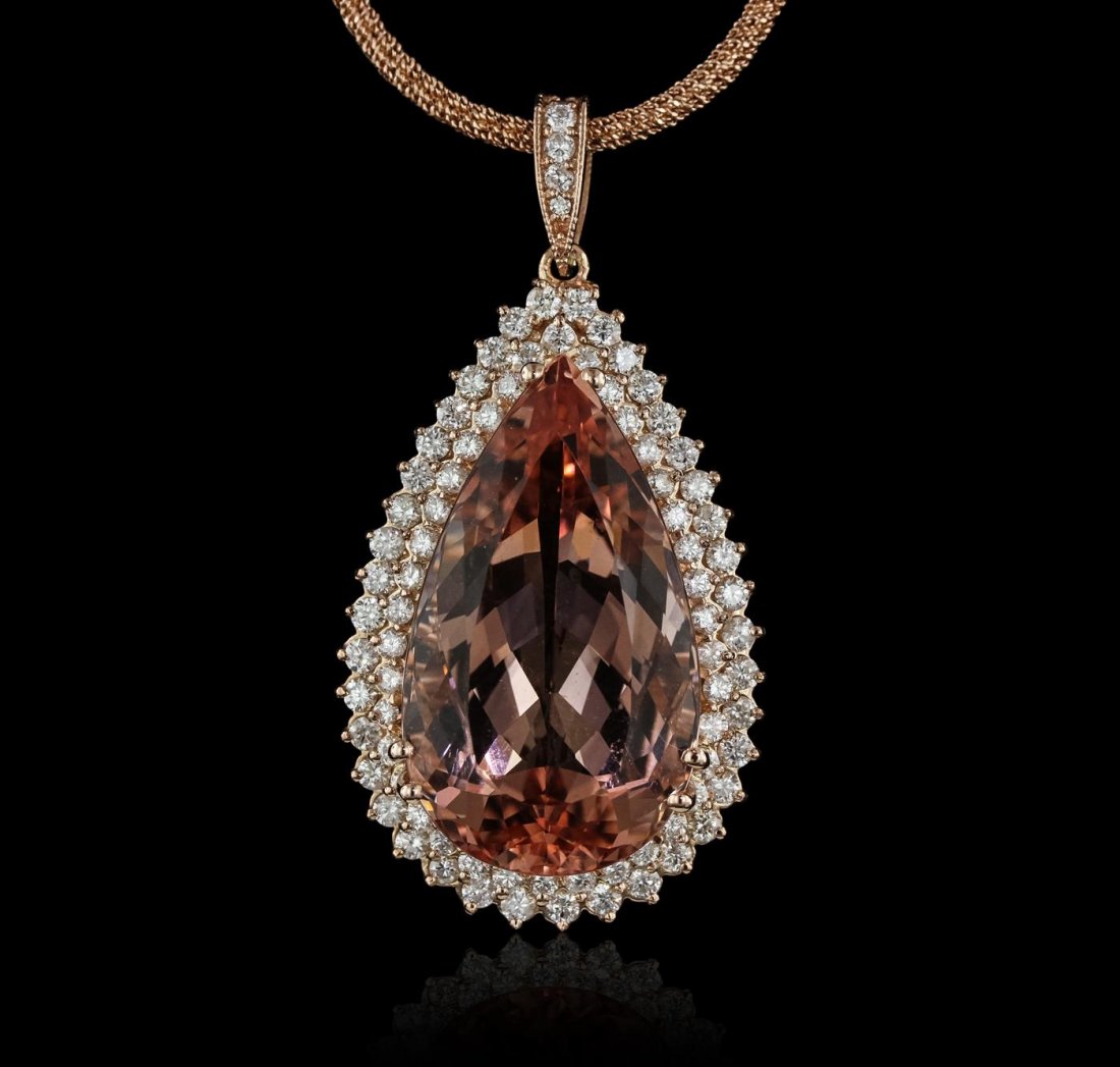 14KT Rose Gold GIA Certified 34.63ct Morganite and: One electronically tested 14KT rose gold ladies cast & assembled morganite and diamond pendant with chain. Condition is new, good workmanship. The pendant features a morganite set within two tiered di