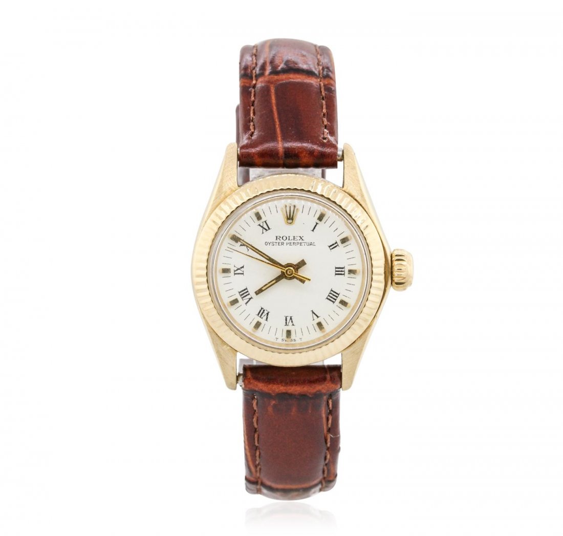 Ladies Vintage Rolex Oyster Perpetual 18KT Yellow Gold: One ladies, vintage Rolex Oyster Perpetual model wristwatch electronically tested 18KT yellow gold, Case: 25mm oyster, Crown: twinlock with logo, Bezel: fluted, Crystal: acrylic lens, Circa: 1955.Move