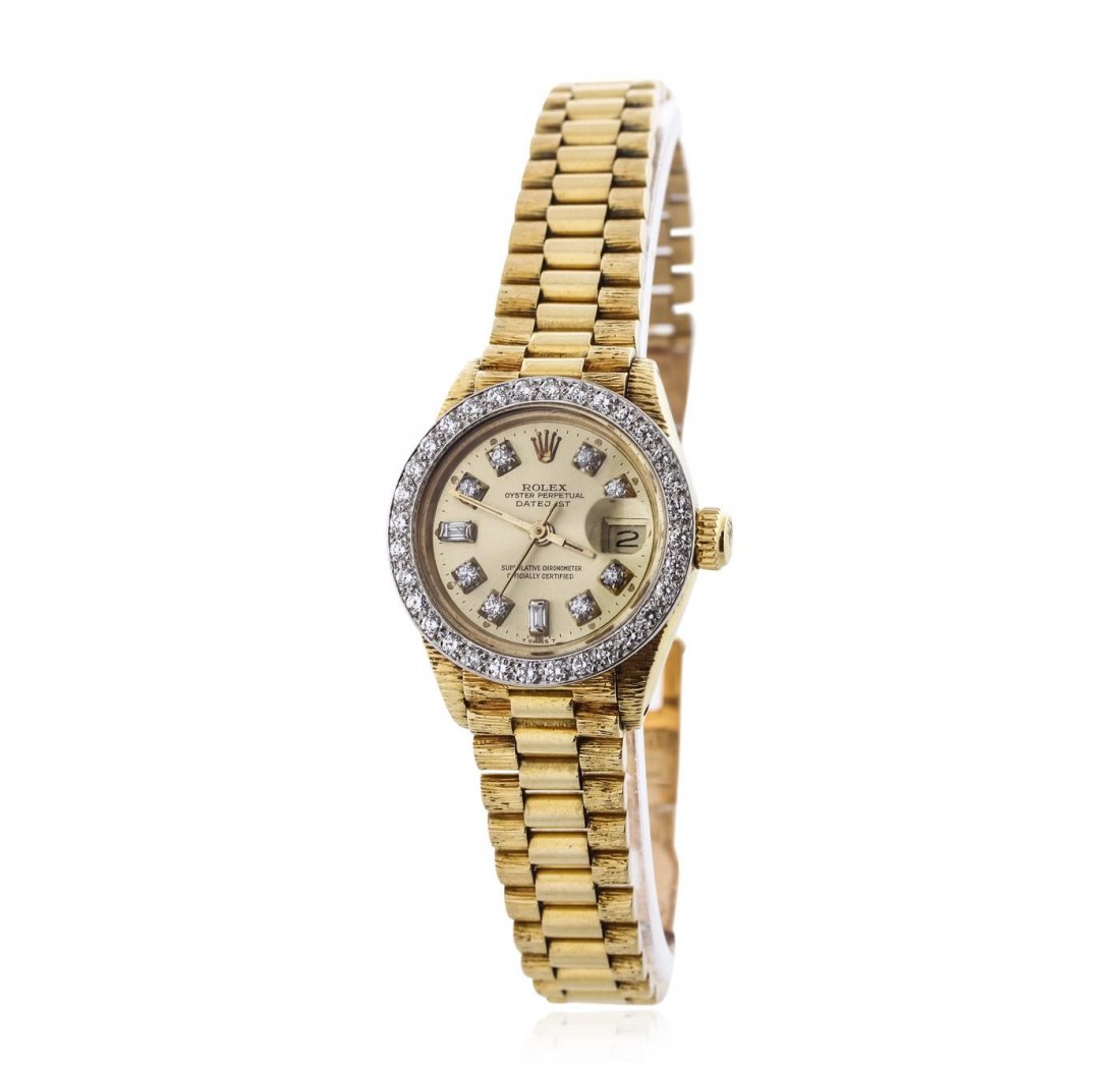 Ladies Rolex 18KT Yellow Gold Diamond DateJust: One ladies, hand crafted & machine milled Rolex Lady President the DateJust model wristwatch electronically tested 18KT yellow gold, Circa: early 1980's, Case: 25mm oyster, Crown: twinlock with logo, 