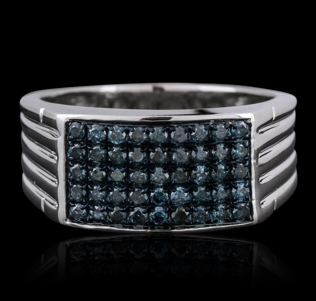14KT White Gold 0.55ctw Diamond Ring: One electronically tested 14KT white gold men's cast ring with a bright polish finish. Condition is new. Identified with markings of "14K". Containing: Forty-Five prong set round brilliant cut diamond