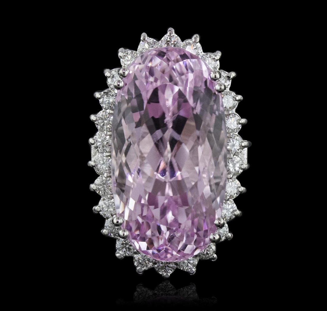 14KT White Gold GIA Certified 38.10ct Kunzite and: One electronically tested 14KT white gold Ladies combination cast & assembled ring with a bright polish finish. Condition is new. Identified with markings of "K14". Containing: One prong set oval modi