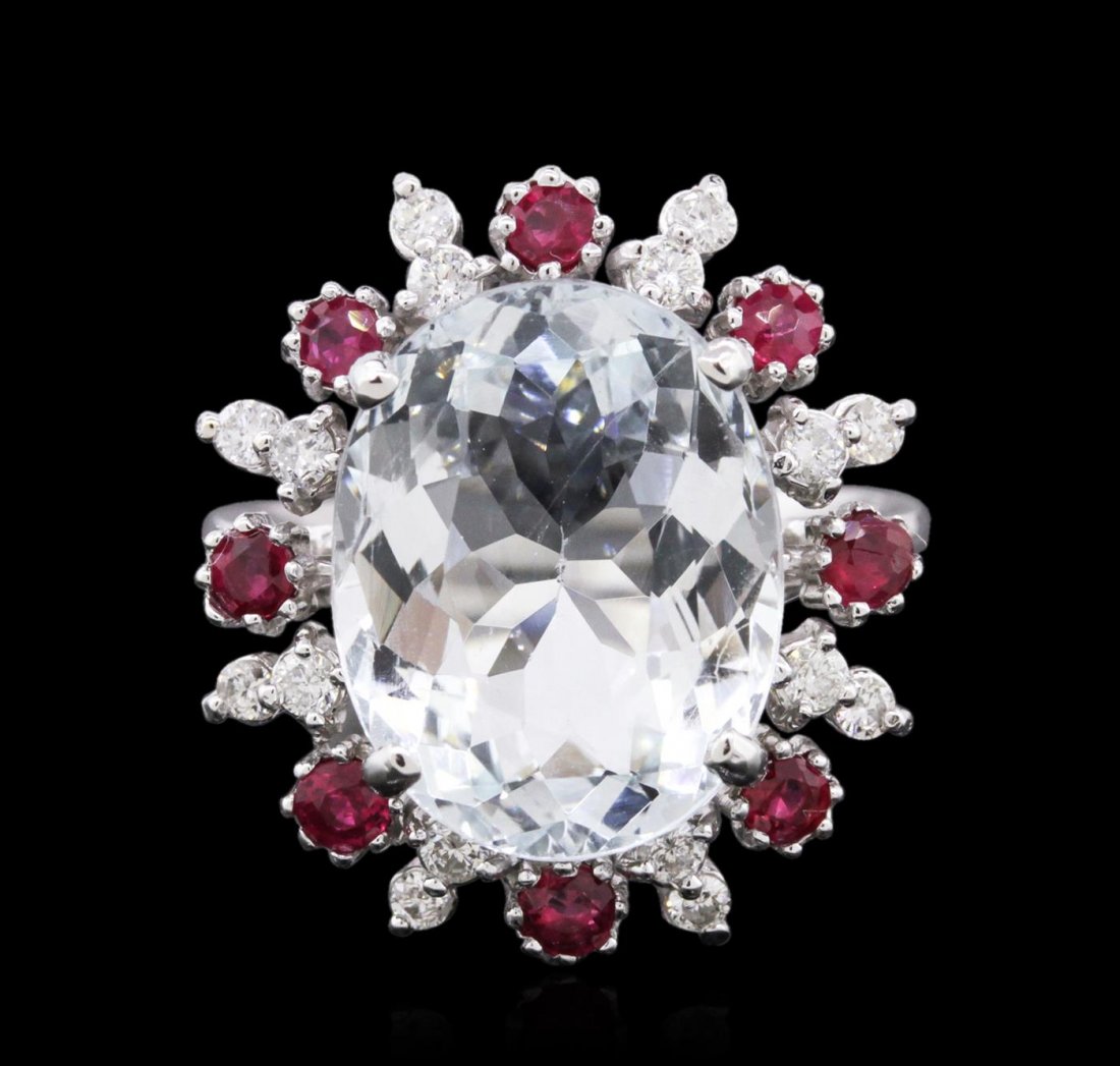 14KT White Gold 5.89ct Aquamarine, Ruby and Diamond: One electronically tested 14KT white gold ladies cast aquamarine, ruby and diamond ring with a bright polish finish. Identified with markings of "K14". Condition is new. Containing: One prong set oval