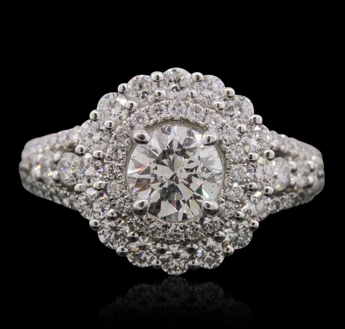 18KT White Gold 2.41ctw Diamond Ring: One electronically tested 18KT white gold Ladies combination cast & assembled engagement ring with a bright polish finish. Condition is new. Containing: One prong set round brilliant cut diamond, meas