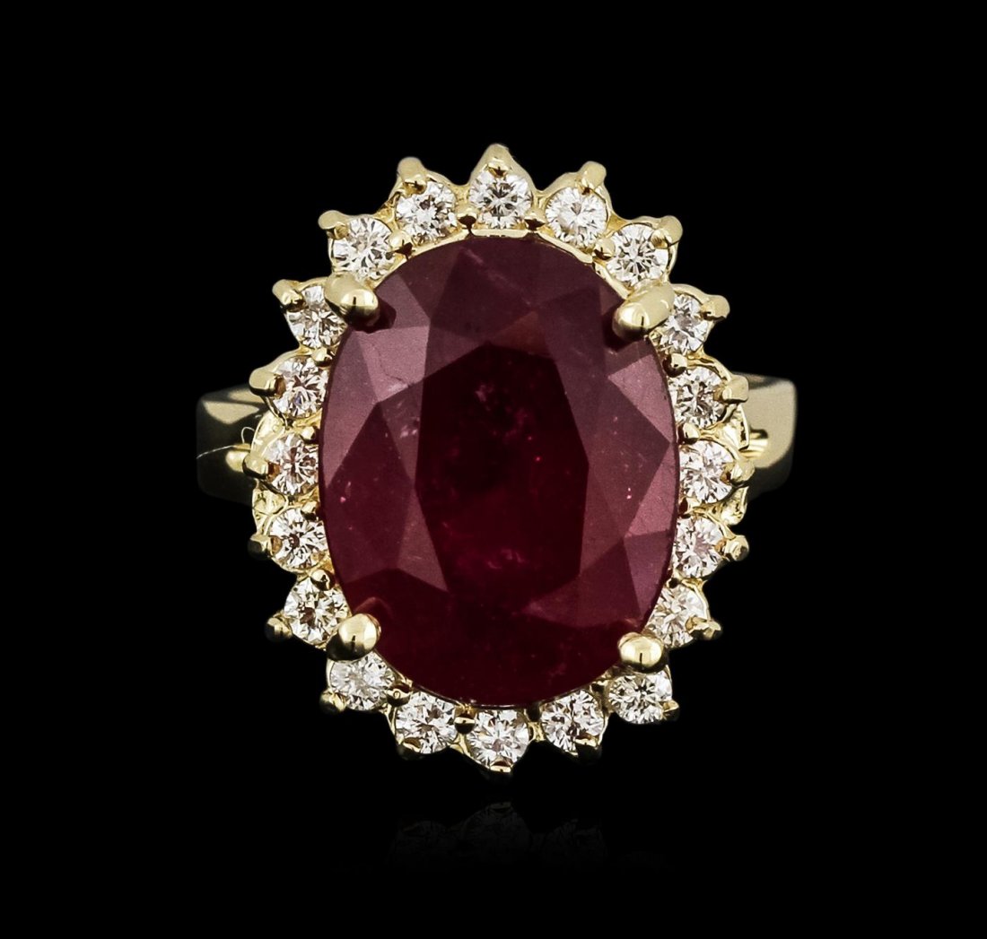14KT Yellow Gold 9.18ct Ruby and Diamond Ring: One electronically tested 14KT yellow gold ladies cast ruby and diamond ring with a bright and brushed finish. Identified with markings of "14K". Condition is new. Containing: One prong set oval modif