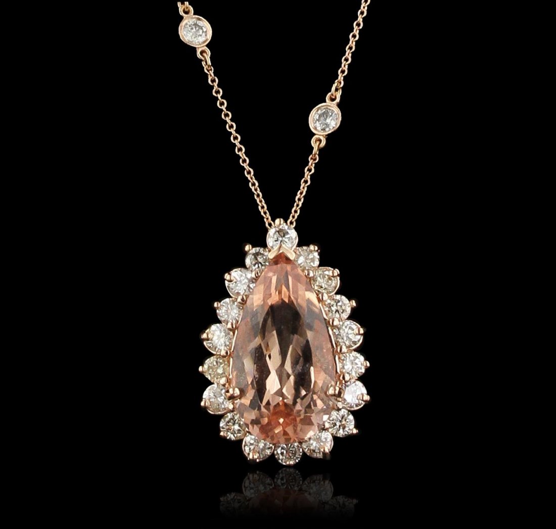 14KT Rose Gold 8.90ct Morganite and Diamond Necklace: One electronically tested 14KT rose gold ladies cast & assembled morganite and diamond necklace. The 14KT rose gold pendant features an emerald set within a diamond bezel, supported by a seventeen inc