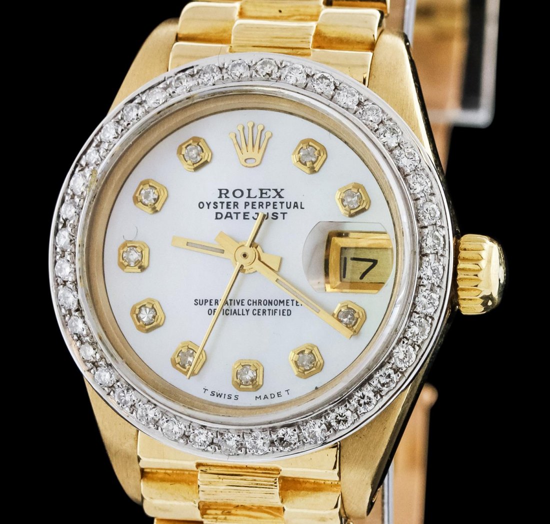 Ladies Rolex 18KT Yellow Gold Diamond DateJust: One ladies, hand crafted & machine milled Rolex DateJust model wristwatch electronically tested 18KT yellow gold, Circa: 1978, Case: 26mm oyster, Crown: twinlock with logo, Custom Bezel: diamond set, 