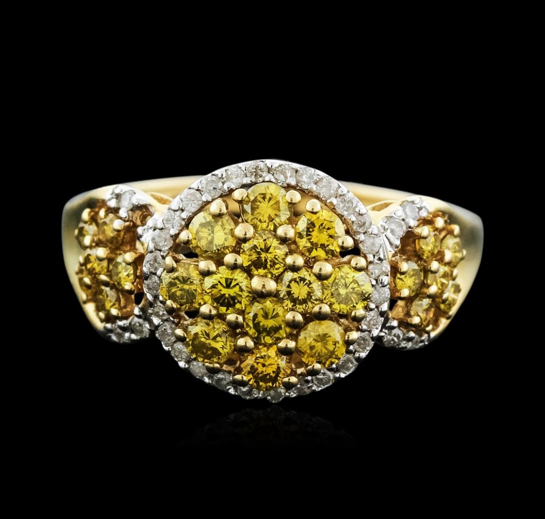 14KT Yellow Gold 1.50ctw Fancy Yellow Diamond Ring: One ring featuring: 14KT yellow gold weighing 4.79 grams containing 24 fancy yellow diamonds with a total weight of 1.24ct and 36 round white diamonds with a total weight of 0.26ct.