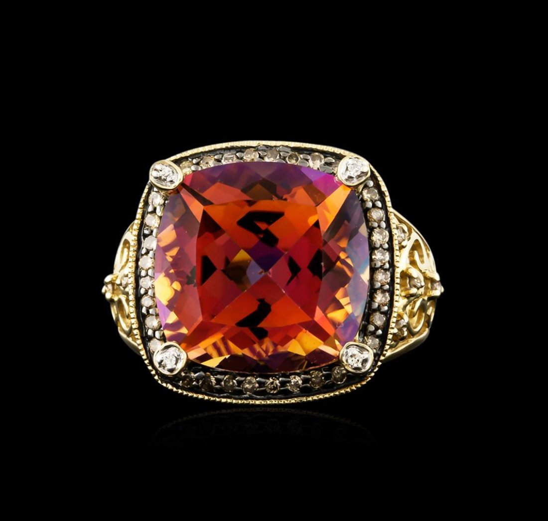 14KT Yellow Gold 11.49ct Sunset Topaz and Diamond Ring: One ring featuring: 14KT yellow gold weighing 5.29 grams containing one sunset topaz with a total weight of 11.49ct, 32 brown diamonds with a total weight of 0.29ct, and four round white diamonds with