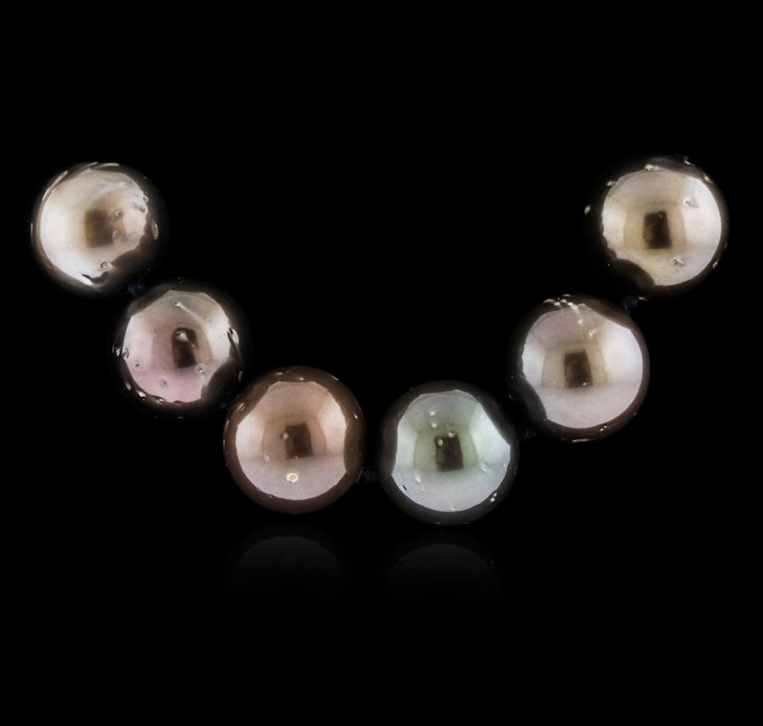 Silver Tahitian Pearl Necklace: One ladies necklace strand strung and knotted onto a silk thread containing: 33 Genuine Tahitian South Sea Cultured Pearls. This item weighs 89.50 grams and measures 17.50 inches in length and 14.05mm