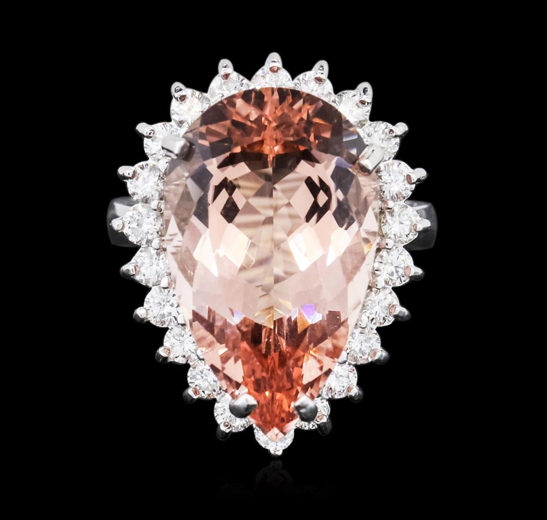 14KT White Gold 12.05ct Morganite and Diamond Ring: One electronically tested 14KT white gold ladies cast morganite & diamond ring with a bright finish. The featured morganite is set within a diamond bezel, supported by a white gold ribbed under galler