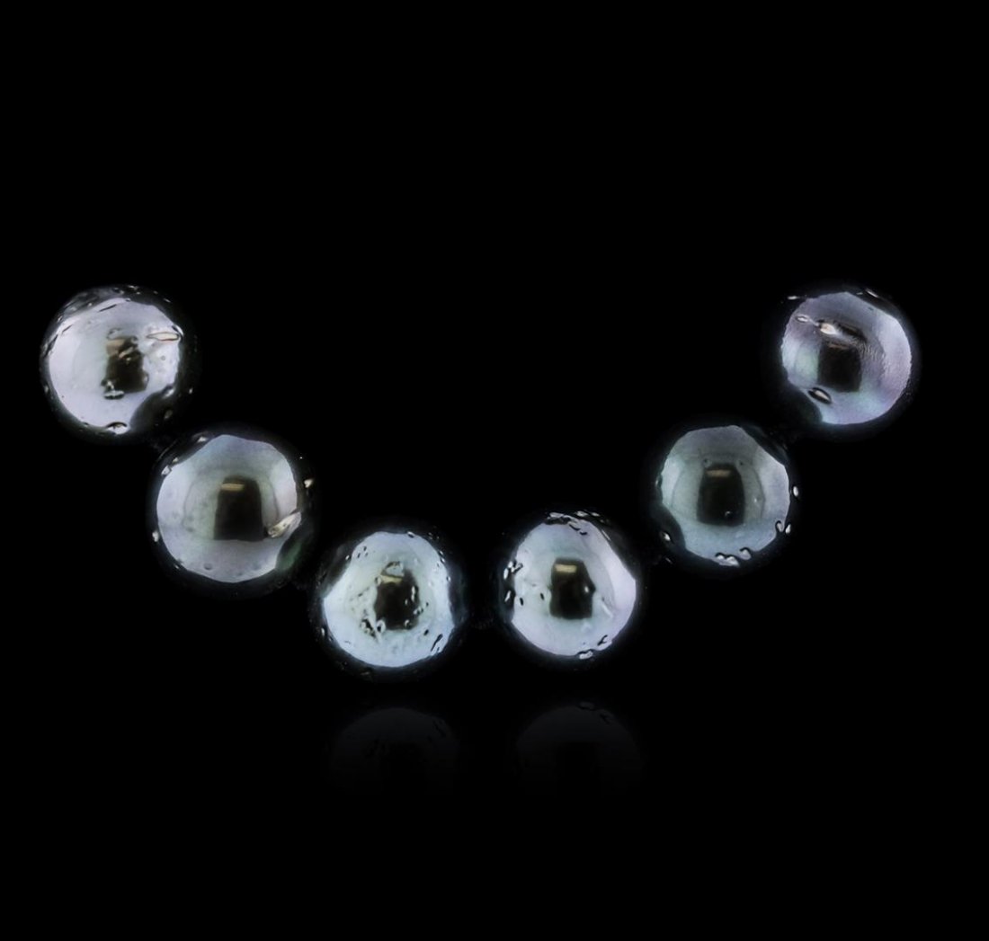Silver Tahitian Pearl Necklace: One ladies necklace strand strung and knotted onto a silk thread containing: 36 Genuine Tahitian South Sea Cultured Pearls. This item weighs 76.01 grams and measures 18.25 inches in length and 13.00mm