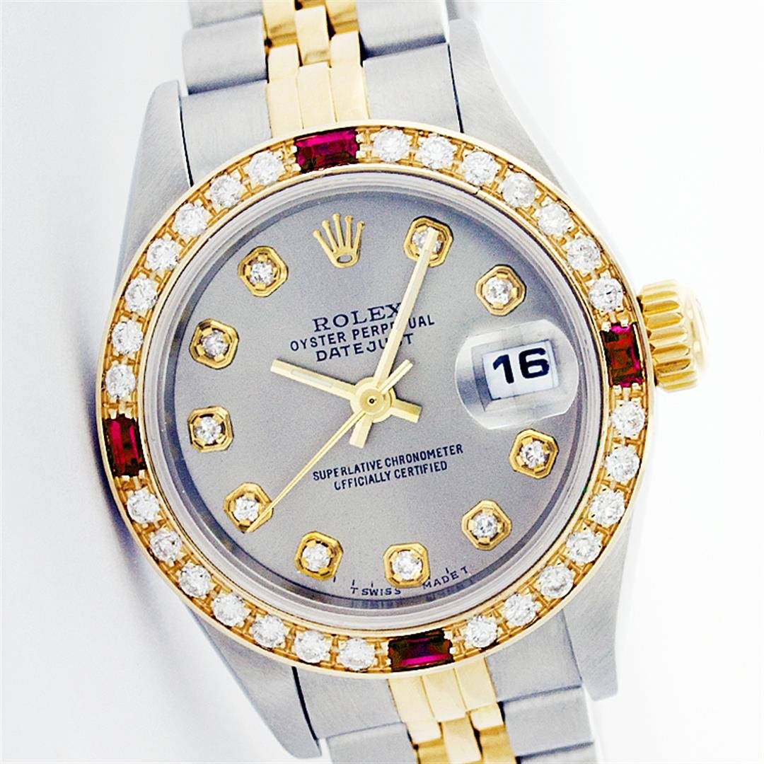 Ladies Rolex Two-Tone Diamond and Ruby DateJust: One Ladies Two Tone Rolex Datejust Polished, Serviced & Electronically Tested, 14K Yellow Gold & Stainless Steel Case:26mm, 14K Yellow Gold Crown, Custom Bezel: 18K Yellow Gold Ruby Beadset Diamond Be