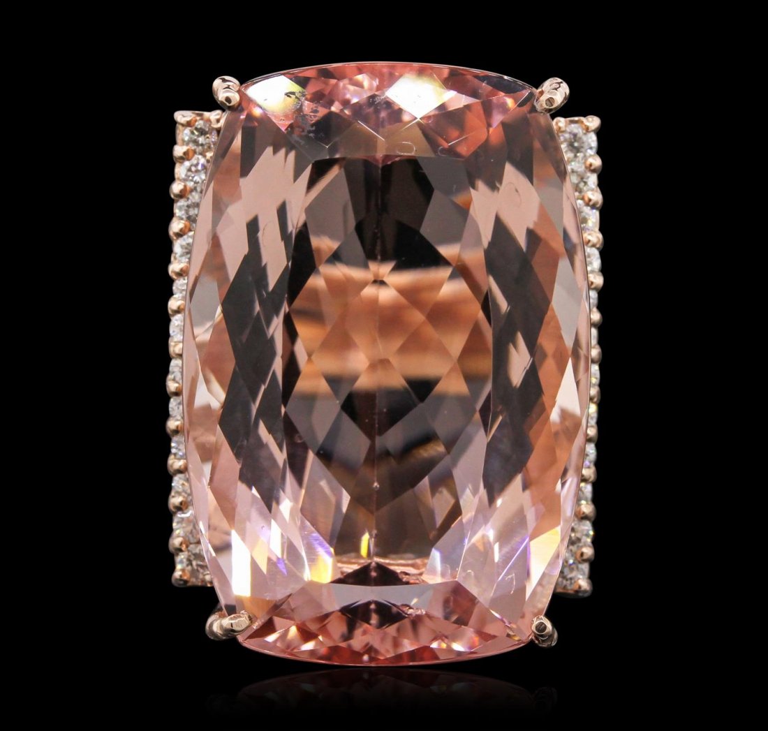 14KT Rose Gold 43.75ct GIA Certified Morganite and: One electronically tested 14KT rose gold ladies cast morganite and diamond ring with a bright polish finish. Condition is new, good workmanship. The featured morganite is set within mirroring diamond 