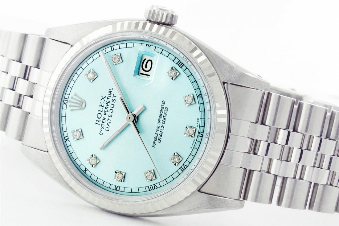 Gents Rolex Stainless Steel DateJust Wristwatch: One Gents Rolex Datejust Polished Bright with Satin Finish, Serviced & Electronically Tested, Stainless Steel Case:36mm, Stainless Steel Crown, Original Bezel: 14K White Gold Fluted Bezel. Custom Crys