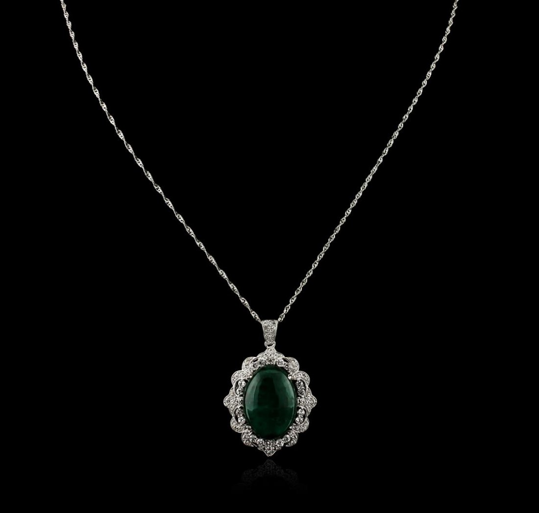 PLATED SILVER 29.14ct Emerald and White Sapphire: One lady's polished, stamped and electronically tested solid platinum plated over silver pendant mounted with: 1 Enhanced Emerald (Beryl) and 62 Genuine Colorless Sapphire (Corundum)s. This item weigh
