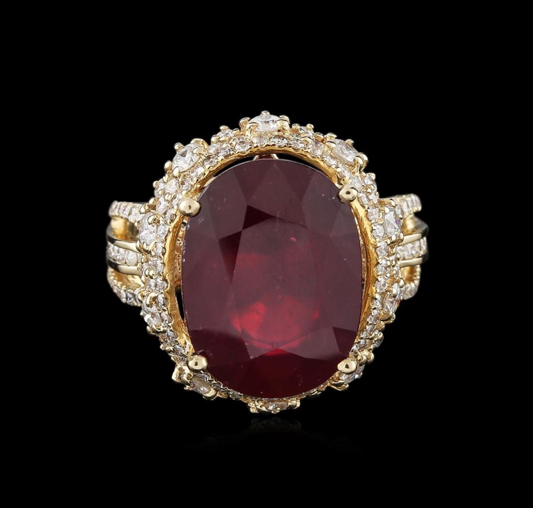 14KT Yellow Gold 13.62ct Ruby and Diamond Ring: One electronically tested 14KT yellow gold ladies cast ruby and diamond ring with a bright polish finish. Condition is new, good workmanship. The featured ruby is set within a tiered diamond bezel sup