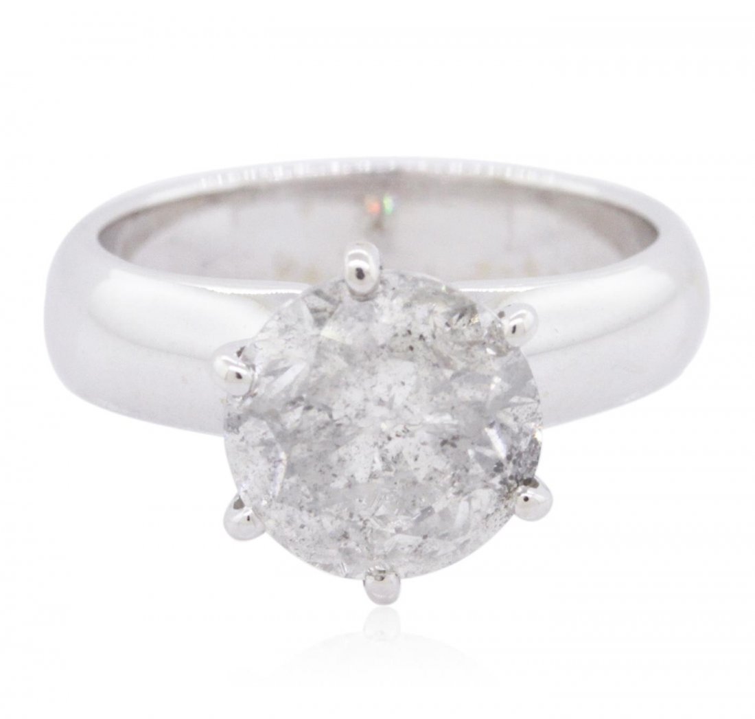 14KT White Gold 3.02ct Brilliant Cut Diamond Solitaire: One electronically tested 14KT white gold ladies cast diamond solitaire ring with a bright polish finish. The ring is completed by a four millimeter wide band. Identified with markings of "14K". Condi